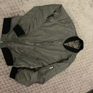 Cute fall/winter bomber jacket in mint condition, zippers work perfectly fine